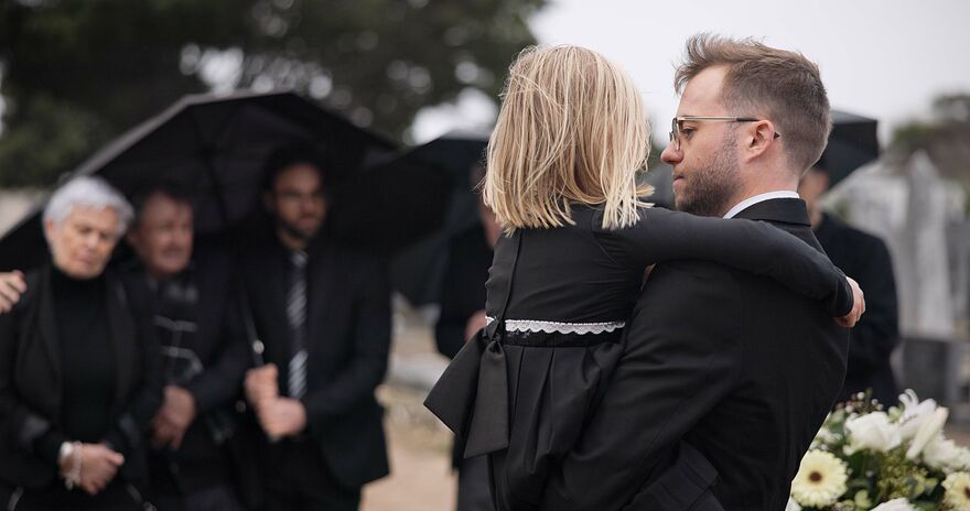 Dad and child at funeral