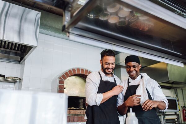 two chefs in kitchen
