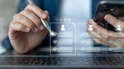 HR professional reviewing digital candidate profiles and resume screening data on virtual interface, supporting recruitment process, talent assessment and hiring management technology.