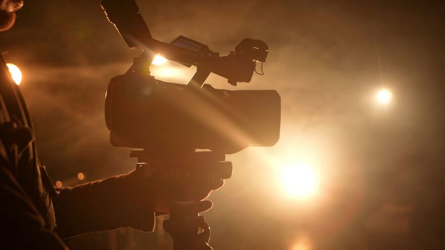 Silhouette of a camera operator