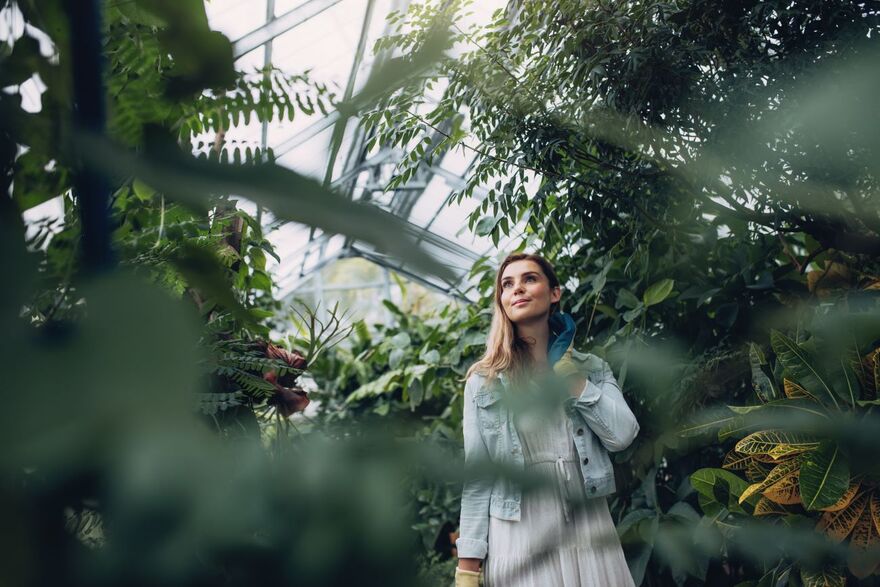 Woman in greenhouse