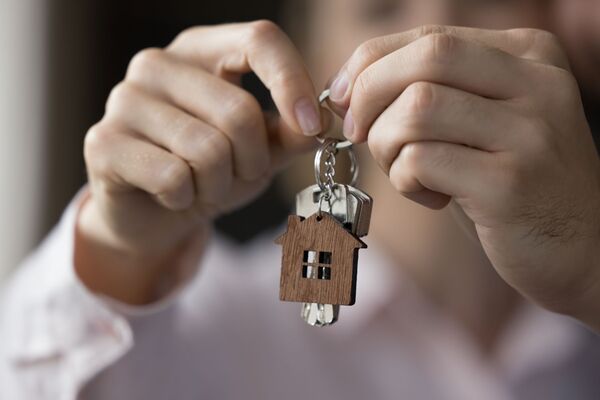 Couple holding house keys