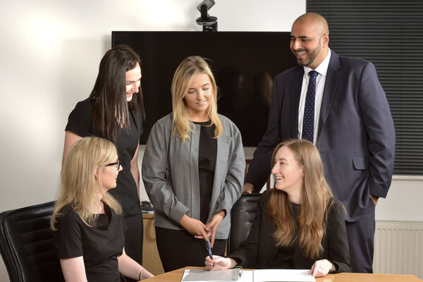 Trainee solicitors working