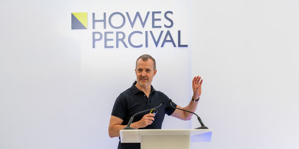 Geraint Davies of Howes Percival speaking at a lecturn