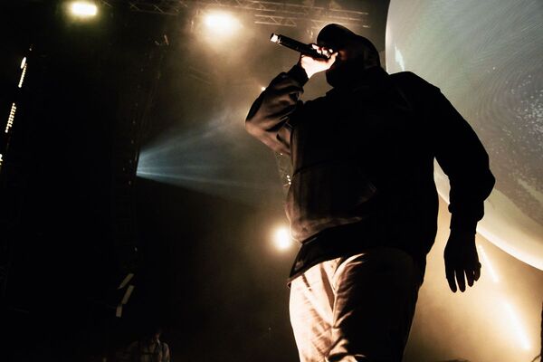 silhouette of rapper in hoodie